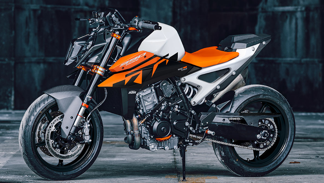 Vue latérale dynamique de la 2026 KTM 990 Duke sur route