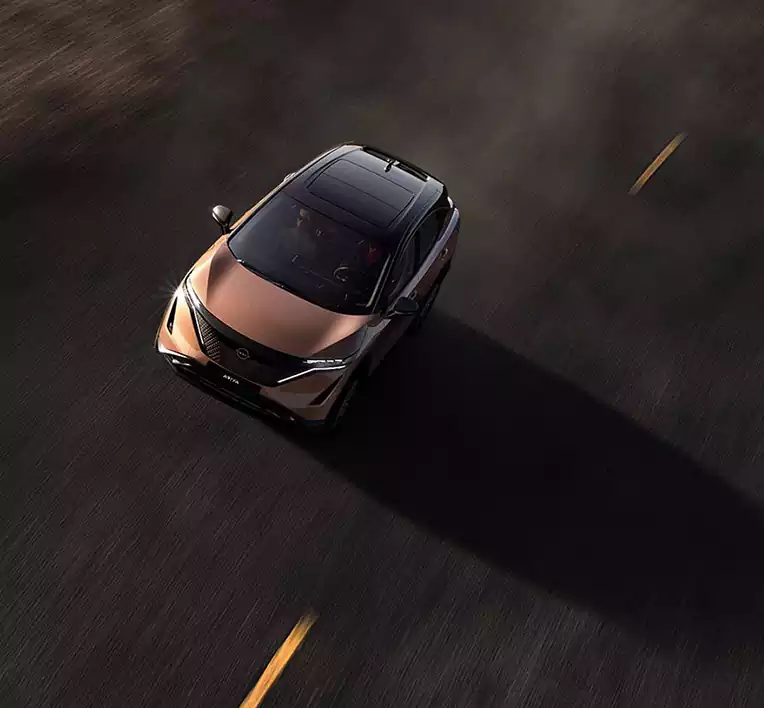 =Nissan ARIYA Chevalley - vue du dessus sur route