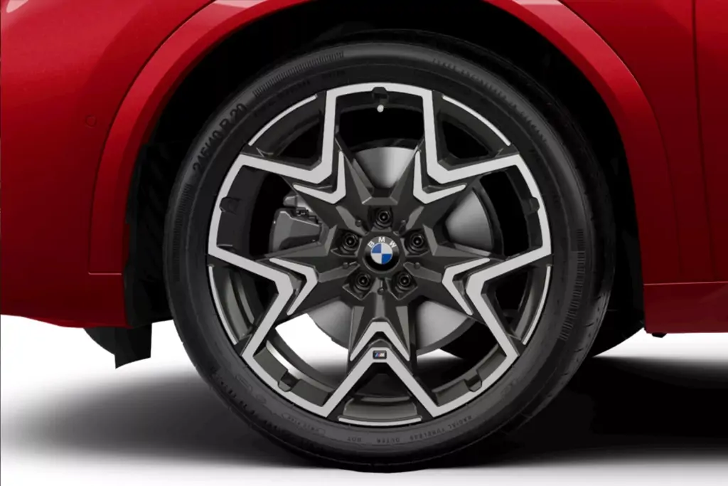 Intérieur du BMW iX2 avec tableau de bord digital et finitions premium