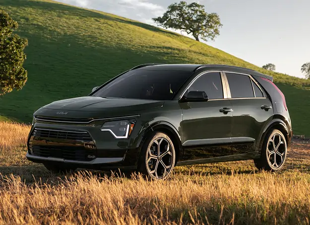 Kia Niro profilé sur fond de paysage naturel